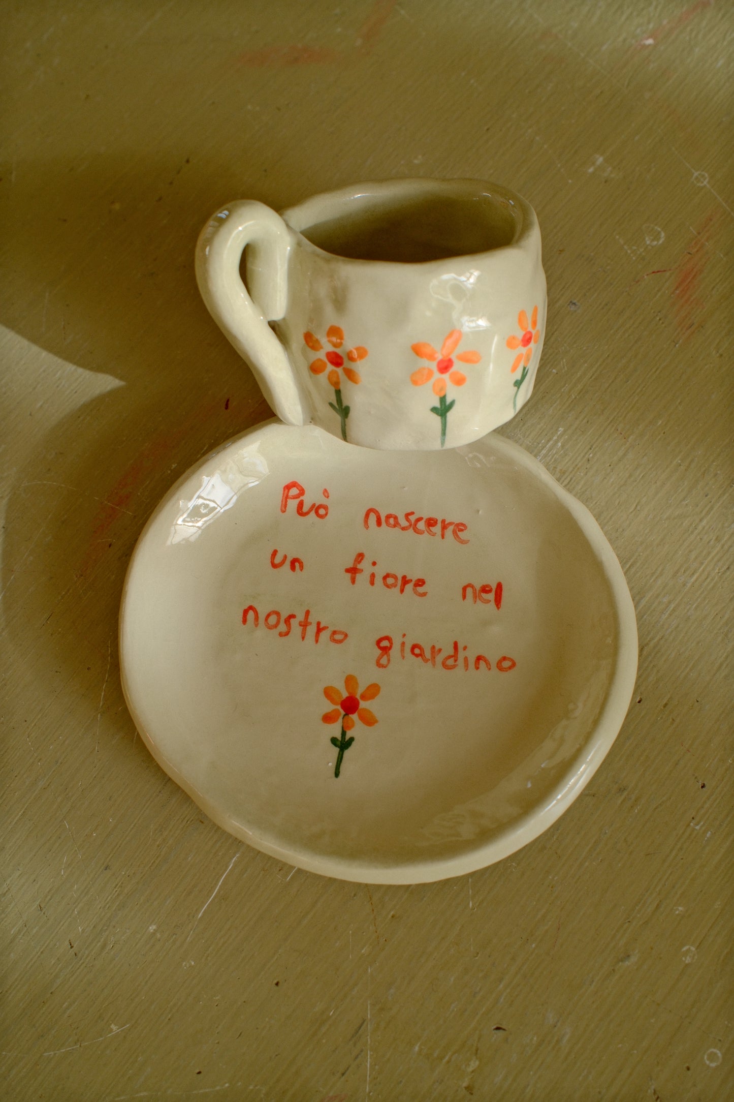 Tazzina da caffè + piattino 
[PUÒ NASCERE UN FIORE NEL NOSTRO GIARDINO]